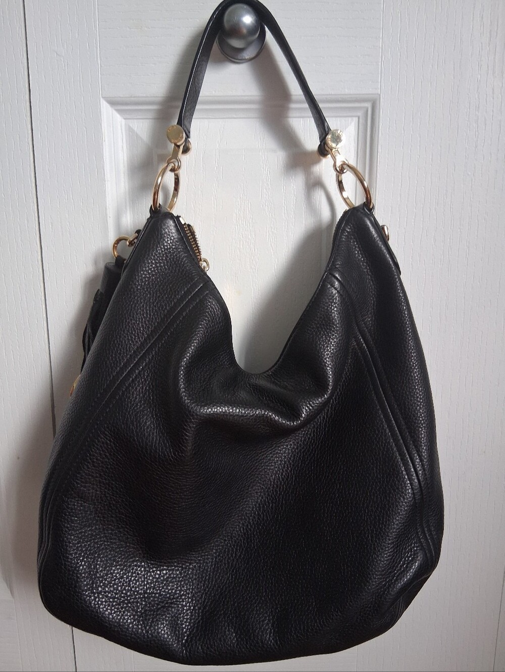 Michael Kors Black Pebbled Leather Hobo with Gold Hardware and Tassel Charm